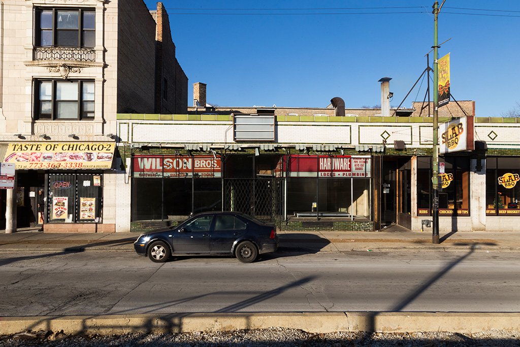 71st Street commercial corridor today, showing vacant storefronts
